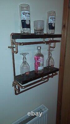 Handmade copper shelving unit with rustic wooden shelves